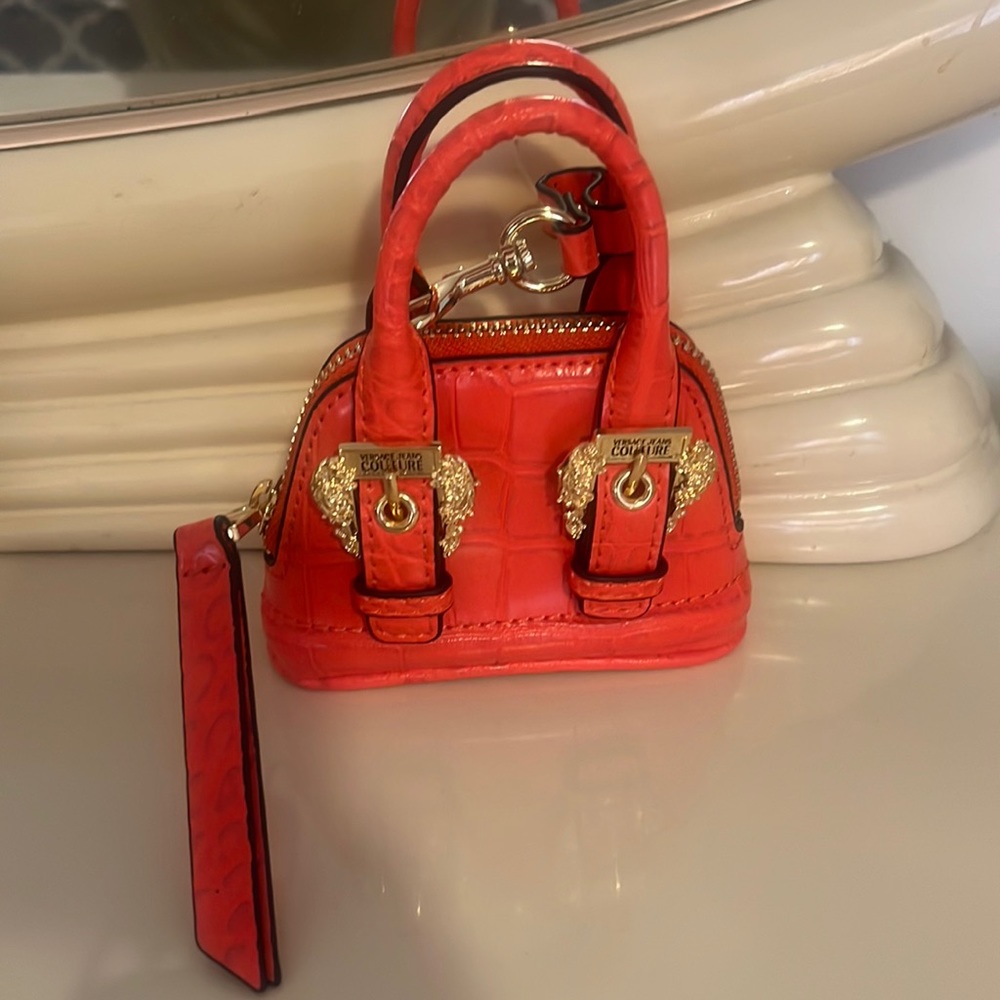 Versace Jeans key chain. Can be used as a tinny purse